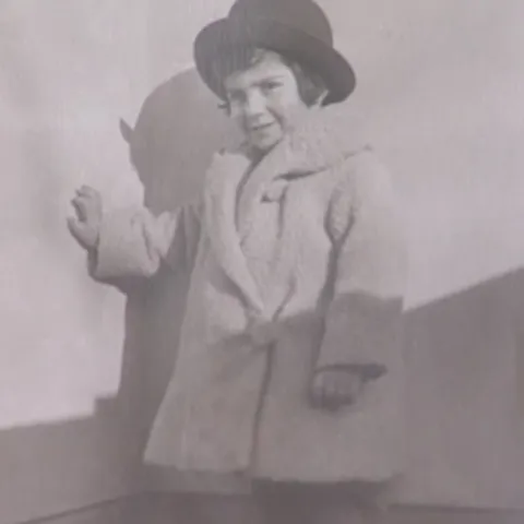Eva in Görlitz (1934). Helene made the outfit that she is wearing.