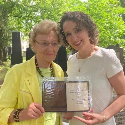 Lauren Leiderman with Elfi Löffler holding a copy of Elfi's entry in Eva's "Posie Book". (2020)